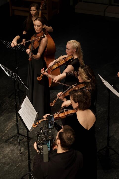 an-ensemble-playing-musical-instruments