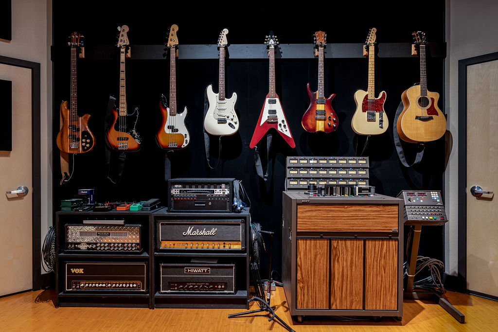 Guitar wall & Sony MCI Tape Machine